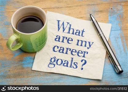 What are my career goals? A question in handwriting on a napkin with a cup of espresso coffee