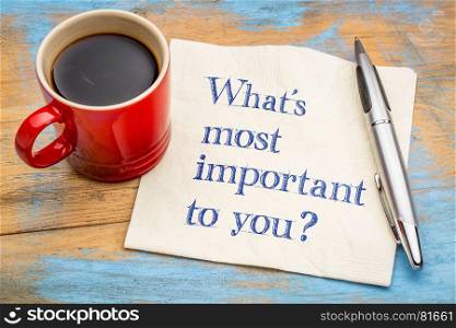 What is important to you? handwriting on a napkin with a cup of coffee