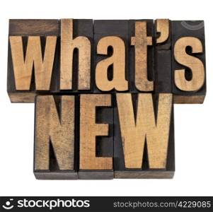 what is new - news concept - isolated phrase in vintage letterpress wood type