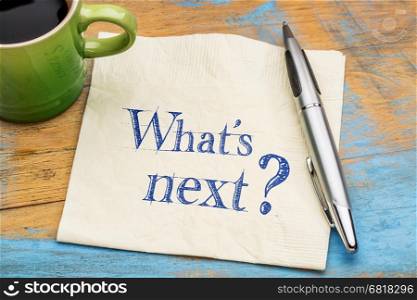 What is next question - handwriting on a napkin with a cup of coffee