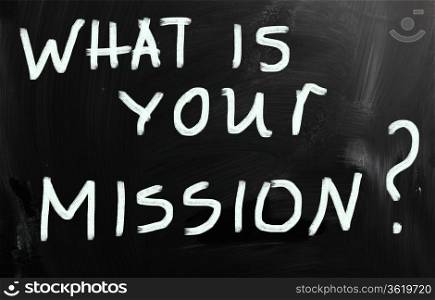 ""What is your mission " handwritten with white chalk on a blackboard"