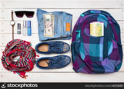 What to Pack in Your Carry On girl Bag - backpack, money, glasses, shoes, jeans, accessories