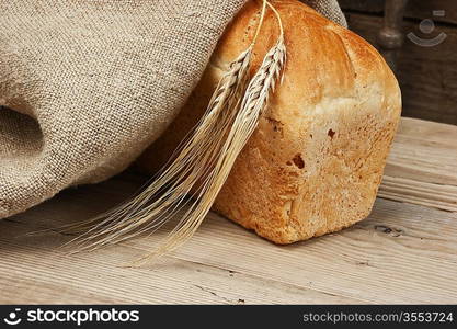 wheat bread on the wooden table