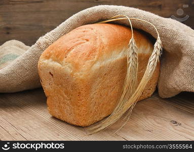 wheat bread on the wooden table