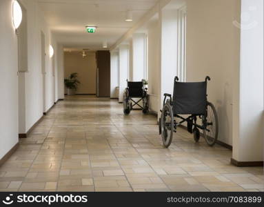 wheelchair in corridor of house for elderly people