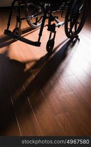 Wheelchair on a wooden floor