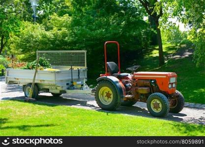Wheeled tractor trailer in the park