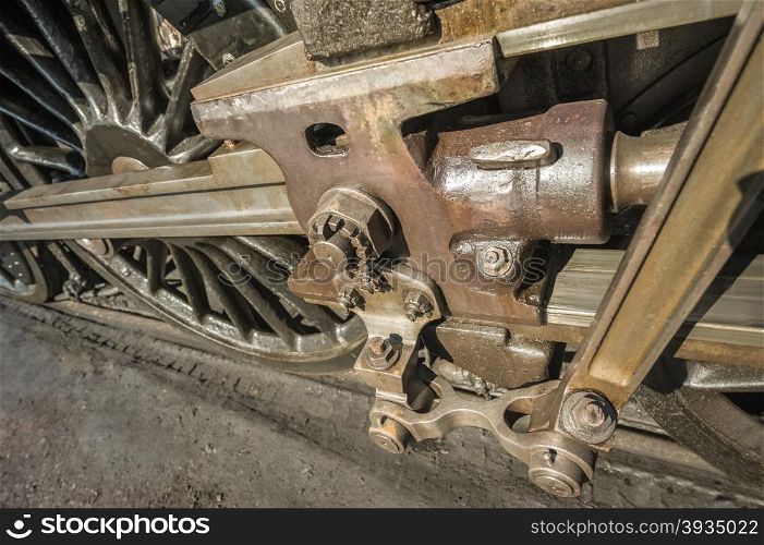 wheels and coupling rods on a vintage steam locomotive
