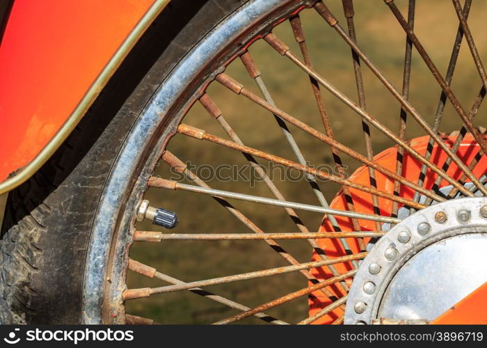 Wheels of motorcycles with tire l close up on the road.