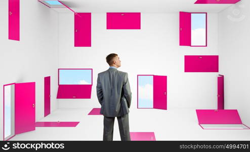 When making difficult decision. Businessman in room choosing one of plenty of doors