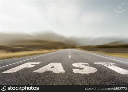 When you feel need for speed. Conceptual image with word on asphalt road