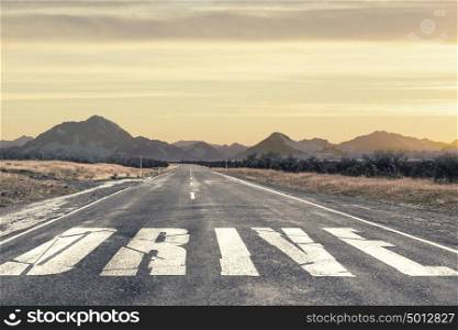 When you feel need for speed. Conceptual image with word on asphalt road