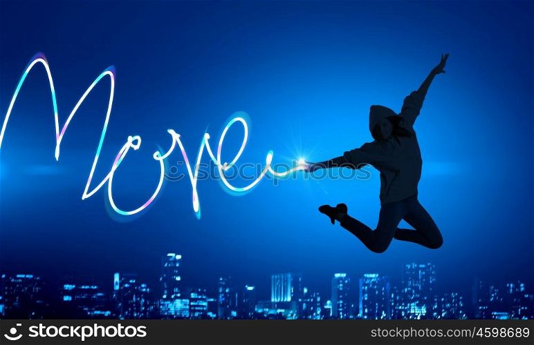 When you young and happy. Young girl jumping high in sky and drawing love word