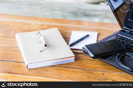 Wherever working table with laptop and stationary, stock photo