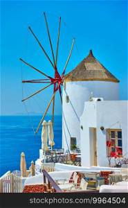 While windmill in Santorini island in Greece