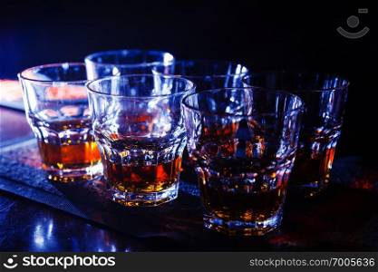 whiskey in a nightclub at the bar close-up