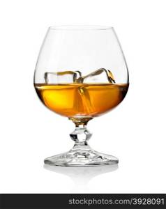 Whiskey in glass with ice on white background