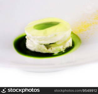 White airy cream-mousse dessert with apple syrup