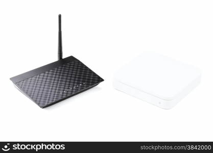 White and black wireless routers isolated on a white background