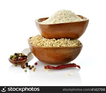 white and brown organic rice in wooden bowls