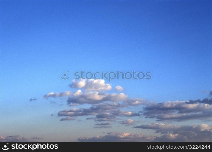 White And Pink Clouds In A Clear Blue Sky