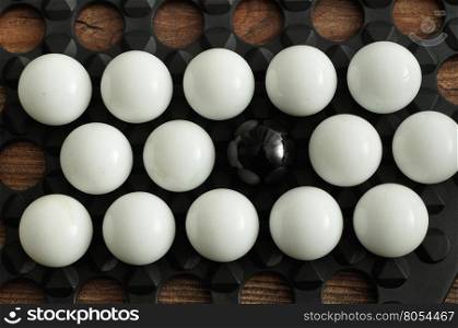 White balls with only one black ball