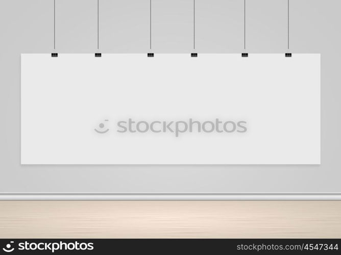 White banner. Blank white banner hanging on wall. Place for text