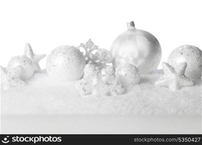 White beautiful Christmas ornaments on snowflakes