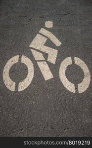 white bike sign on road