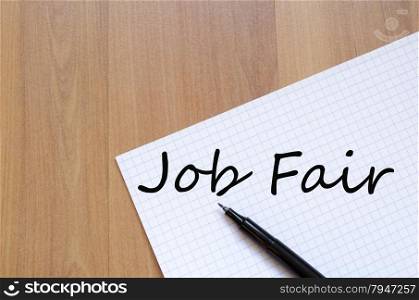 White blank notepad on office wooden table Job fair concept