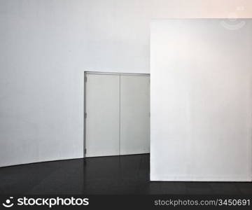 white blank wall with door photo