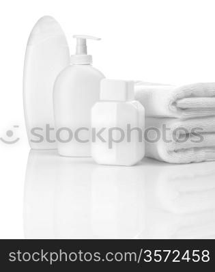 white bottles and towels
