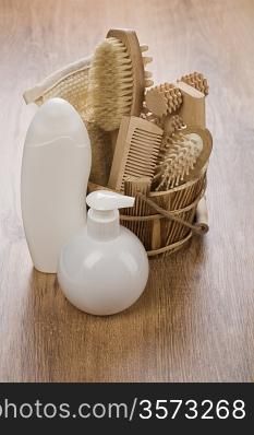 white bottles and wooden bucket