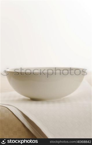 White bowl on cloth