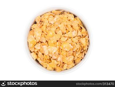 White bowl with natural organic granola cereal corn flakes on white.Top view