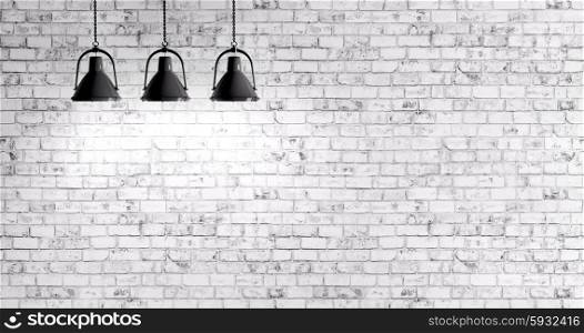 White brick wall with three lamps background