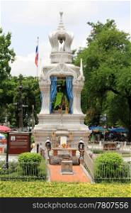 White buddhist shrine on the street in Bangkok, Thailand