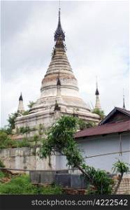 White buddhist stupa on the hill near lake Inle, Myanmar