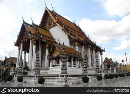 White buddhist temple in wat Suthat in Bangkok, Thailand