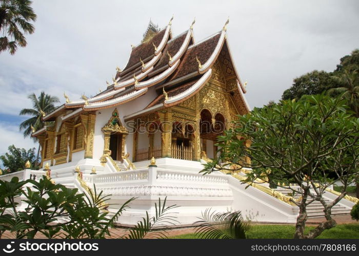 White buddhist temple near royal palace in Luang Prabang, Laos