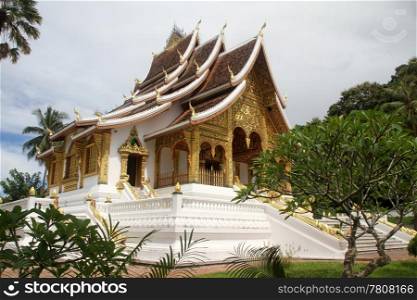 White buddhist temple near royal palace in Luang Prabang, Laos