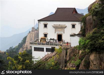 White buddhist temple on the mount in Jiuhua Shan, China