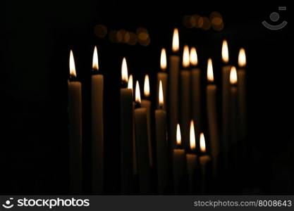 White Candle flames on a black background