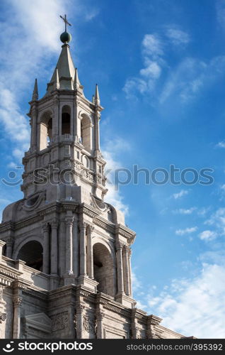 white cathedral on the background of the cloudy sky