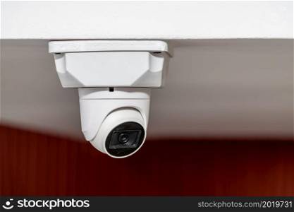 White ceiling mounted security camera with night vision