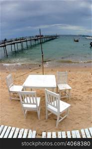White Chairs on the Beach in Thailand.