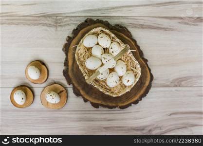 white chicken eggs basket wooden table