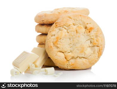 White chocolate biscuit cookies with chocolate blocks and curls on white.