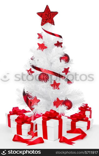 White christmas tree and presents isolated on white background