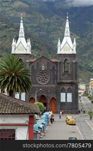 White church on the main square in Banyos in Ecuador